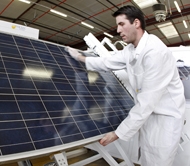 photo of lab tech making solar panel